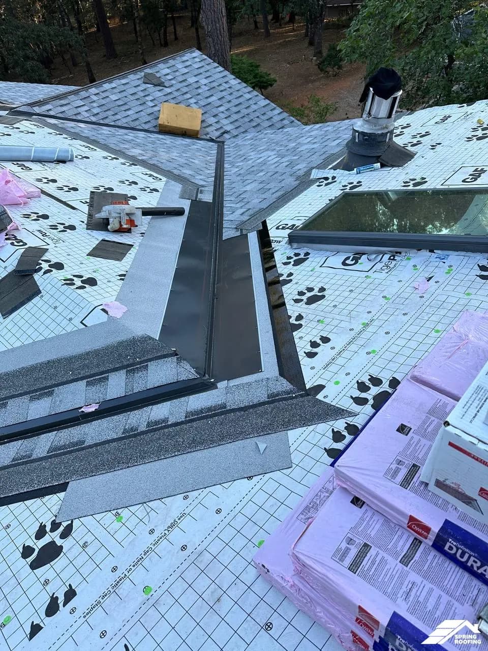 Roof Repair — Shingle Roof with Granulated Cap Underneath Valley