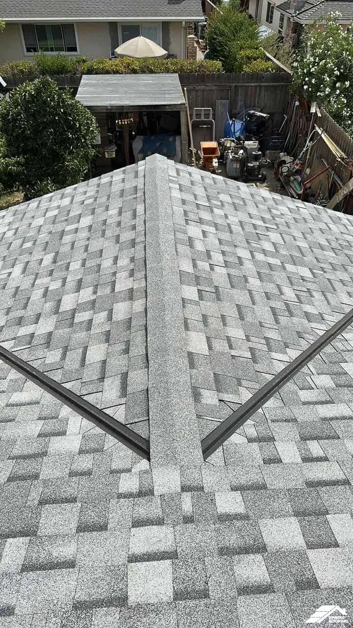 Roof Repair — Shingle Roof with Granulated Cap Underneath Valley (1)