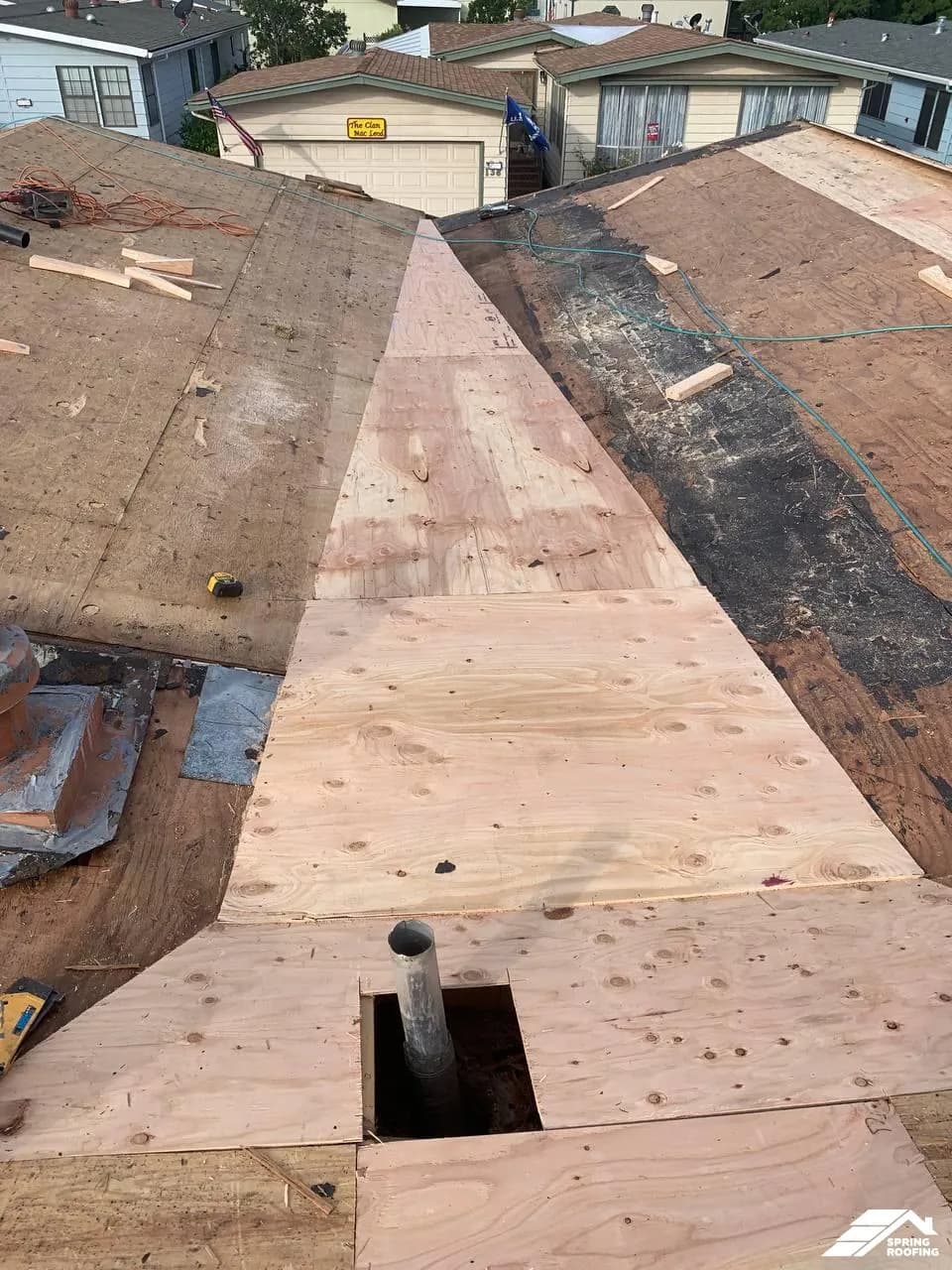 Roof Modification — Install cricket between house and garage (4)