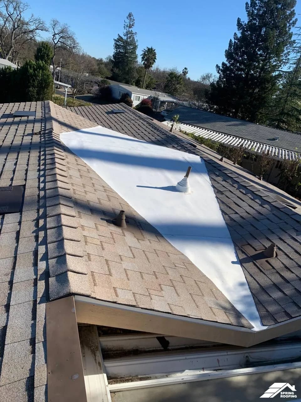 Roof Modification — Install cricket between house and garage